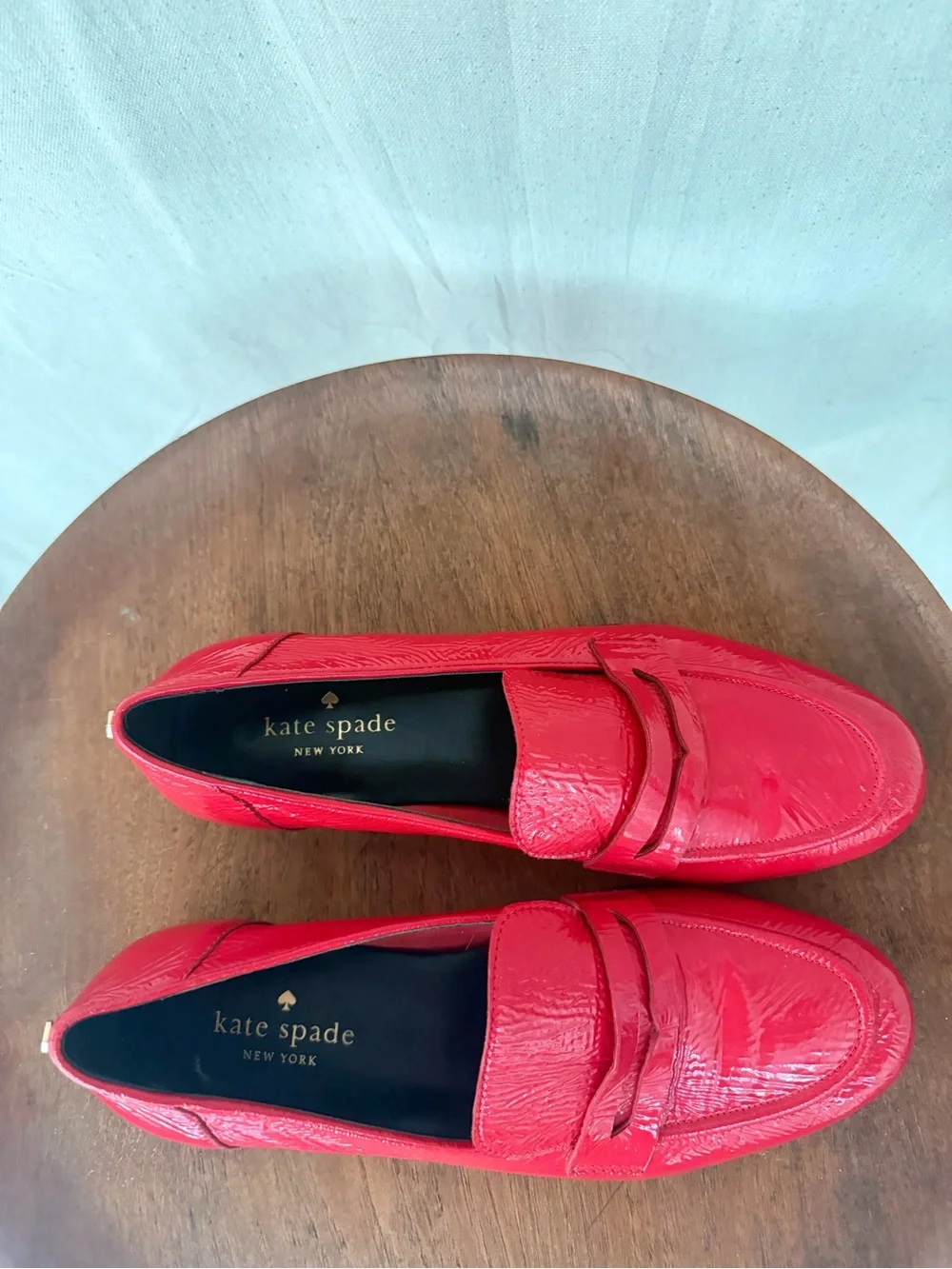 Kate Spade “Genevieve” crinkle parent loafers in Maraschino Red
